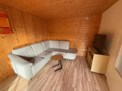 Ein Sitzbereich in der Unterkunft moderne Apartments am Attersee Dachsteinblick - ruhige Lage mit traumhaften Blick