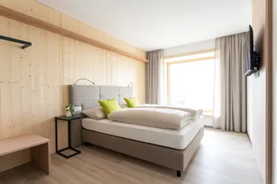 Ein Bett oder Betten in einem Zimmer der Unterkunft eee Hotel Eberstalzell