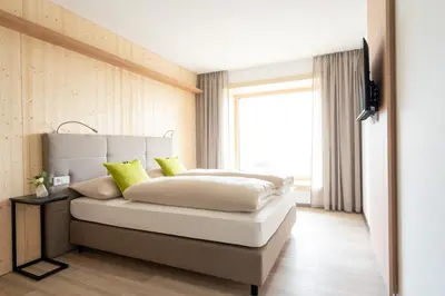 Ein Bett oder Betten in einem Zimmer der Unterkunft eee Hotel Eberstalzell