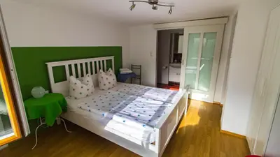 Ein Bett oder Betten in einem Zimmer der Unterkunft Rauhbergerhof