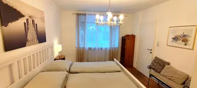 Ein Bett oder Betten in einem Zimmer der Unterkunft Apartment Ischl Home