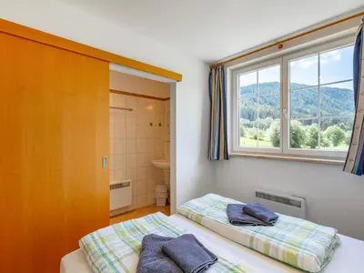 Ein Bett oder Betten in einem Zimmer der Unterkunft Apartment Top 6 by Interhome