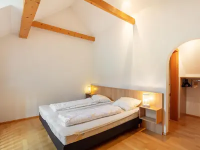 Ein Bett oder Betten in einem Zimmer der Unterkunft Apartment Top 7 by Interhome