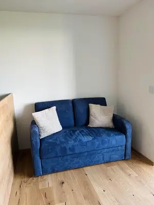 Ein Sitzbereich in der Unterkunft Grünberg Apartments