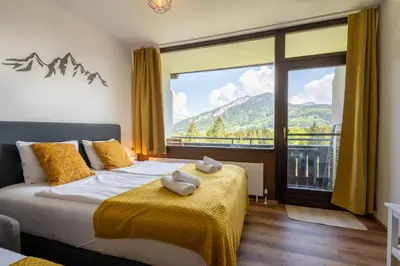 Ein Bett oder Betten in einem Zimmer der Unterkunft Ferienwohnung Panoramaglück