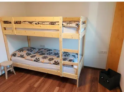 Ein Bett oder Betten in einem Zimmer der Unterkunft Ski & Alps Tamsweg
