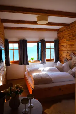 Ein Bett oder Betten in einem Zimmer der Unterkunft Gmundnerberghaus - ROOMS