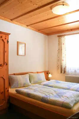 Ein Bett oder Betten in einem Zimmer der Unterkunft Apartment Bleisch