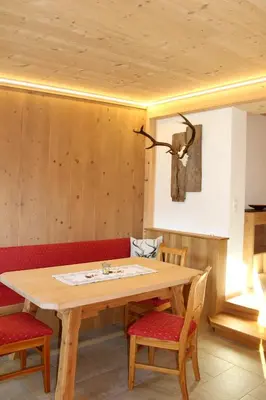 Ein Sitzbereich in der Unterkunft Apartment Urstöger