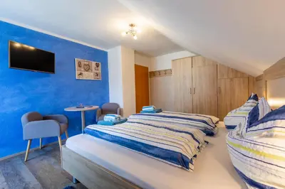 Ein Bett oder Betten in einem Zimmer der Unterkunft Haus Pitzer/Apartments Troicher