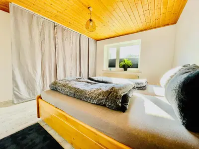 Ein Bett oder Betten in einem Zimmer der Unterkunft Ferienwohnung Bosruckblick