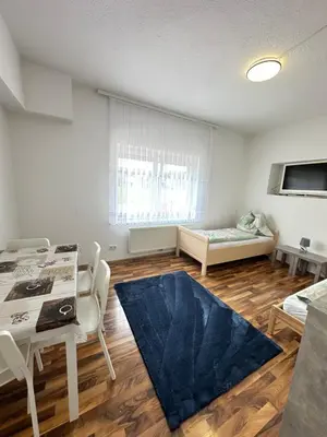 Ein Sitzbereich in der Unterkunft Appartement Schwanenstadt