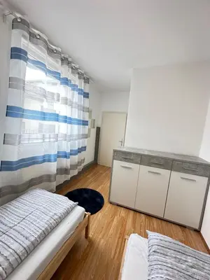 Ein Bett oder Betten in einem Zimmer der Unterkunft Appartement Schwanenstadt