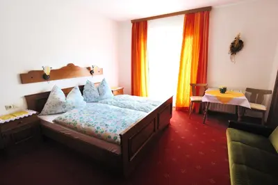 Ein Bett oder Betten in einem Zimmer der Unterkunft Buttermilchalm