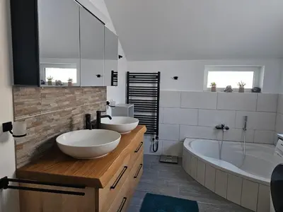 Ein Badezimmer in der Unterkunft Ferienhof Mittermair