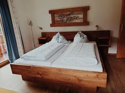 Ein Bett oder Betten in einem Zimmer der Unterkunft Ferienhof Mittermair