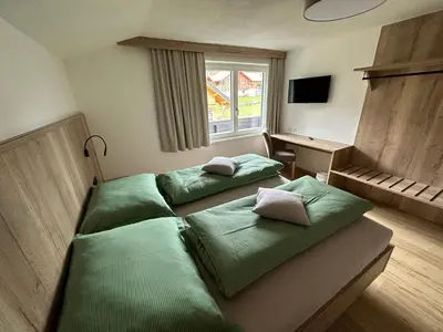 Ein Bett oder Betten in einem Zimmer der Unterkunft Appartement Ski-Willy
