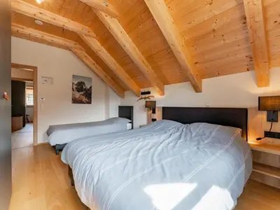 Ein Bett oder Betten in einem Zimmer der Unterkunft Auerhahn