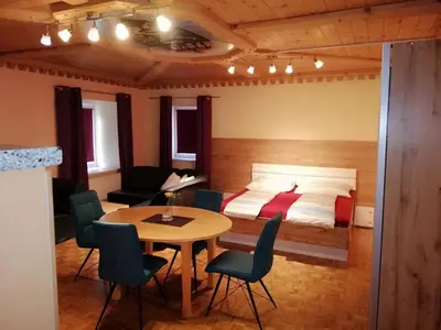 Ein Sitzbereich in der Unterkunft Zimmer und Appartement Marktcafe Sankt Peter am Kammersberg 87