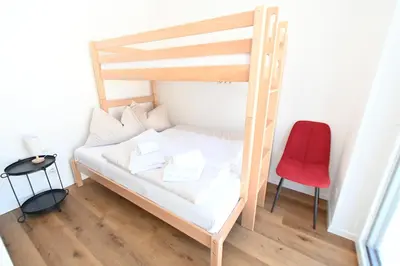 Ein Bett oder Betten in einem Zimmer der Unterkunft Arton Lachtal - Apartments Steiermark