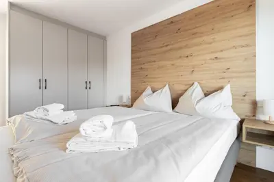 Ein Bett oder Betten in einem Zimmer der Unterkunft Arton Lachtal - Apartments Steiermark