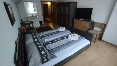 Ein Bett oder Betten in einem Zimmer der Unterkunft Steinadler Apartments Quiet Location Garden, Private Parking Pet Friendly