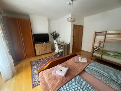 Ein Bett oder Betten in einem Zimmer der Unterkunft Steinadler Apartments Quiet Location Garden, Private Parking Pet Friendly