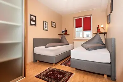Ein Bett oder Betten in einem Zimmer der Unterkunft Papagenoblick