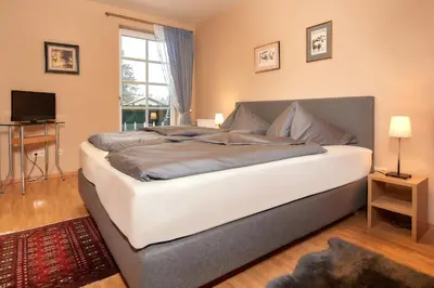 Ein Bett oder Betten in einem Zimmer der Unterkunft Papagenoblick