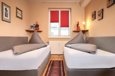Ein Bett oder Betten in einem Zimmer der Unterkunft Papagenoblick