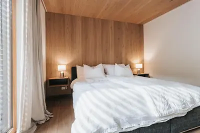 Ein Bett oder Betten in einem Zimmer der Unterkunft Villa Seeblick - Your Austrian Home