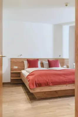 Ein Bett oder Betten in einem Zimmer der Unterkunft ALPINE Appartement 208 Schladming by globboard