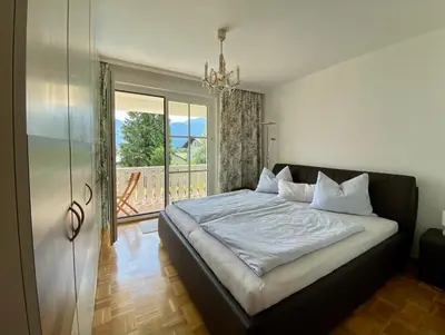 Ein Bett oder Betten in einem Zimmer der Unterkunft Luxury-Suites Traunsee