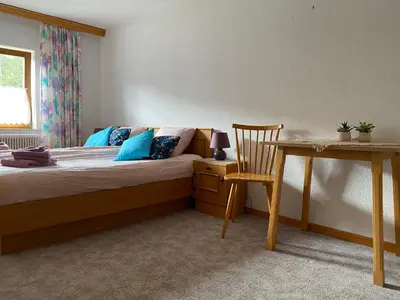 Ein Bett oder Betten in einem Zimmer der Unterkunft Haus Tanne Abtenau