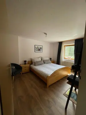 Ein Bett oder Betten in einem Zimmer der Unterkunft Haus Tanne Abtenau