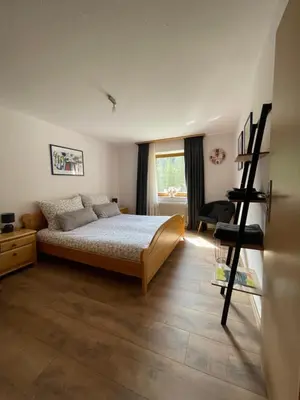 Ein Bett oder Betten in einem Zimmer der Unterkunft Haus Tanne Abtenau