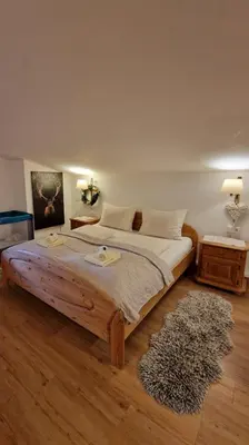 Ein Bett oder Betten in einem Zimmer der Unterkunft Apartment Sunset am Wolfgangsee