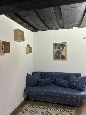 Ein Sitzbereich in der Unterkunft Blue House