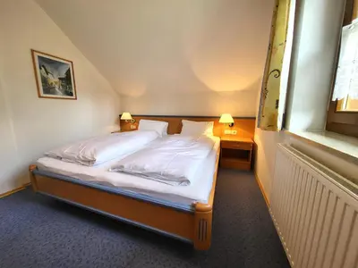 Ein Bett oder Betten in einem Zimmer der Unterkunft Appartements Höller