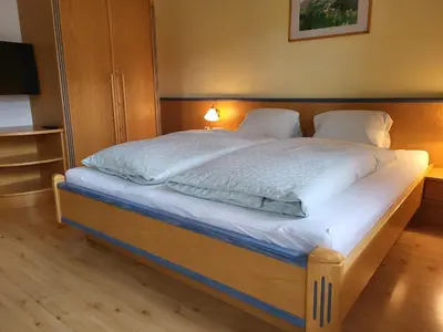 Ein Bett oder Betten in einem Zimmer der Unterkunft Appartements Höller