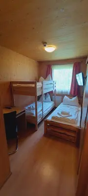 Ein Bett oder Betten in einem Zimmer der Unterkunft Grebenzenblick
