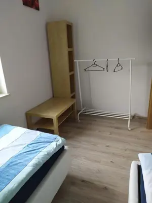 Ein Bett oder Betten in einem Zimmer der Unterkunft Ferienwohnung