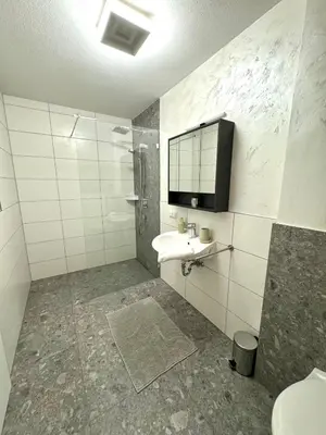 Ein Badezimmer in der Unterkunft Alpin Apartments