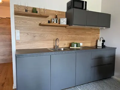 Küche/Küchenzeile in der Unterkunft Wolfgangsee Ferienappartement „Almliebe“