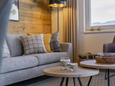 Ein Sitzbereich in der Unterkunft Alpenchalet Lambert