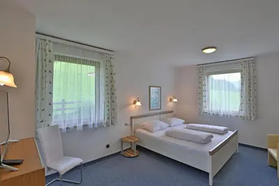 Ein Bett oder Betten in einem Zimmer der Unterkunft Ferienhaus Maurer