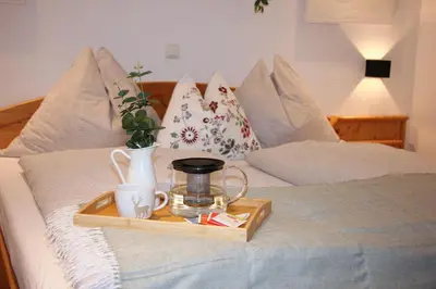 Ein Bett oder Betten in einem Zimmer der Unterkunft Zur STOCKERin - Ferienwohnung