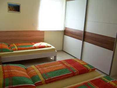 Ein Bett oder Betten in einem Zimmer der Unterkunft LANDHAUS JASMIN ausgezeichnet mit 4 Kristallen - FW Sarsteinblick