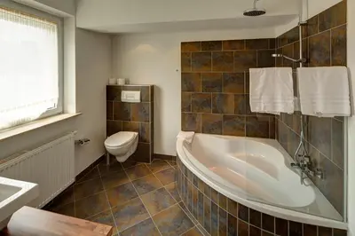 Ein Badezimmer in der Unterkunft Gästehaus Leimer Bräu
