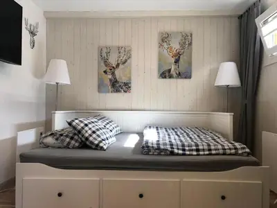 Ein Bett oder Betten in einem Zimmer der Unterkunft Kreischberg Chalet Ferienpark 3